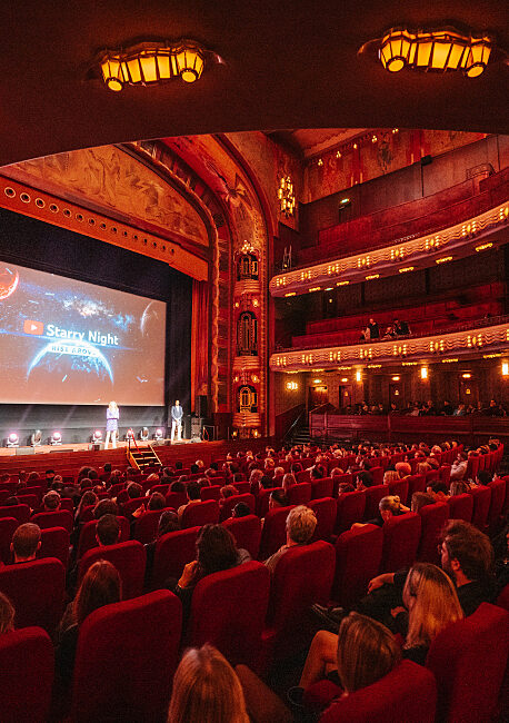 Private screening in a theater with a cozy atmosphere, promoting employee experience and recognition